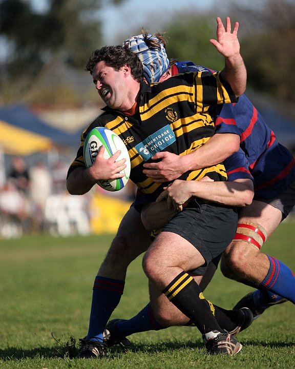 Ross Wakeham tackles Gareth Brown